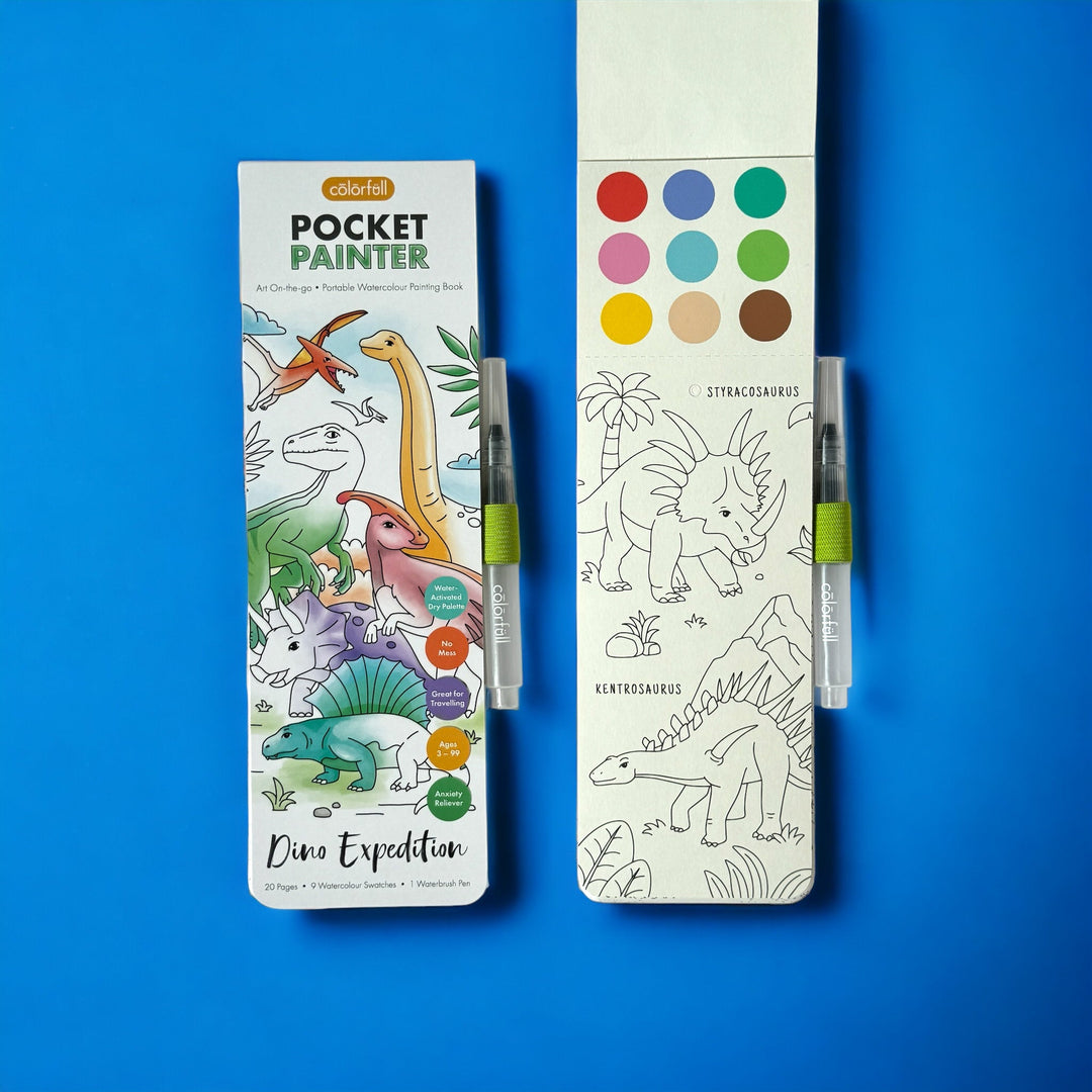 Dinosaur Expedition pocket painter watercolor painting booklet displayed alongside paint palette cards and a water brush pen on a bright blue background.