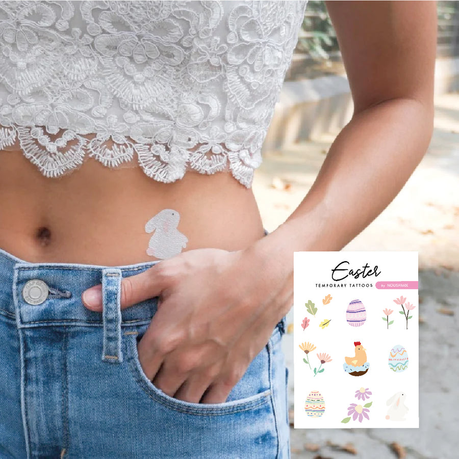 Person wearing a pastel temporary tattoo on their lower waist alongside an inset preview of the Easter pastel sticker sheet.